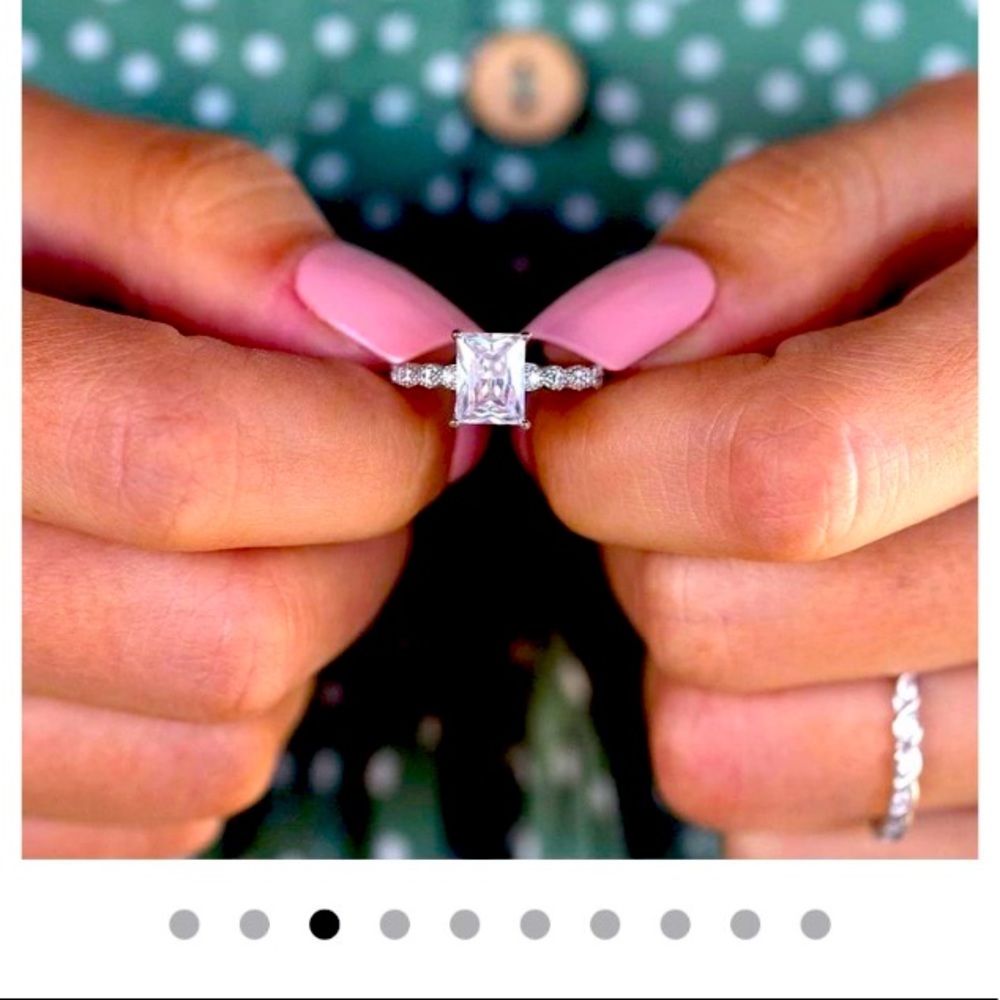 A Charming and Vintage Emerald Cut Engagement Ring